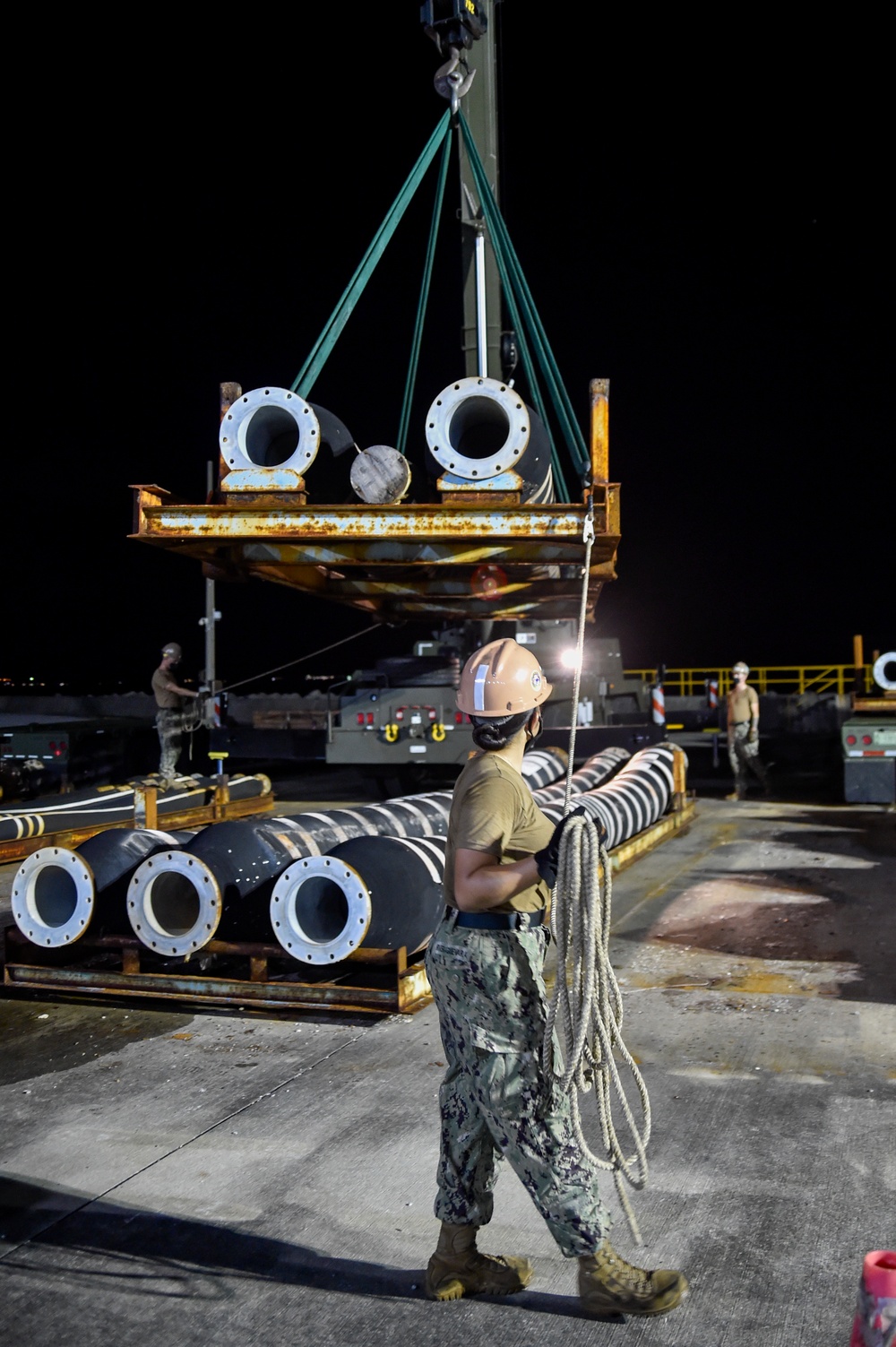 U.S. Navy Seabees assigned to NMCB-5 support the Defense Logistics Agency