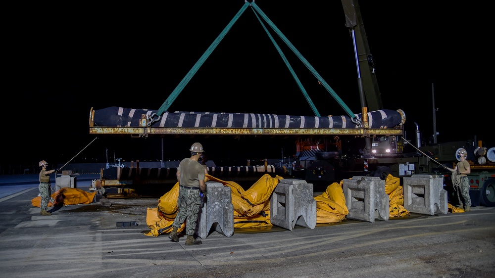 U.S. Navy Seabees assigned to NMCB-5 support the Defense Logistics Agency