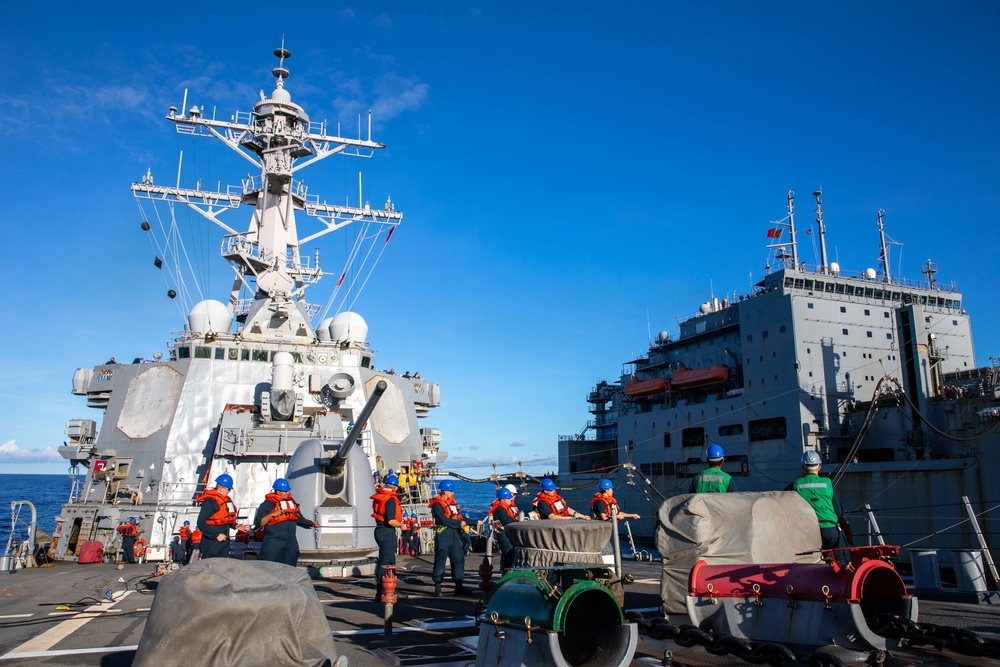 USS Barry conducts a Replenishment-at-sea with the USNS Alan Shepard