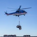 A 330J Puma Helicopter assigned to the USNS Alan Shepard delivers Supplies to the USS Barry