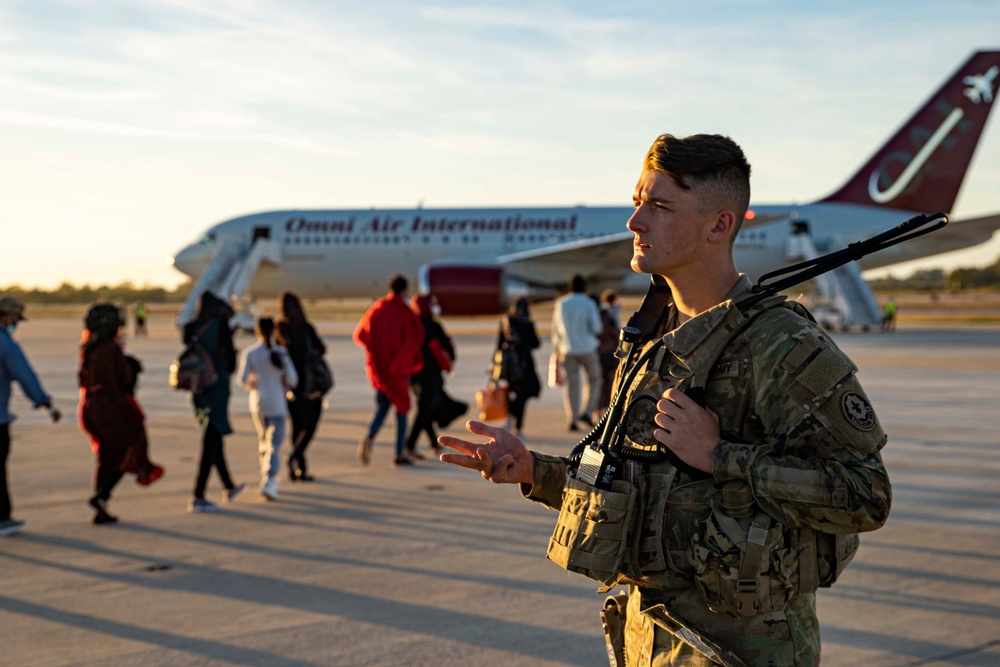 Evacuees depart NAVSTA Rota for the United States