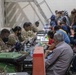 Soldiers Record Afghan Evacuees' Biometrics in Qatar