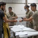 Soldiers Record Afghan Evacuees' Biometrics in Qatar