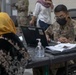 Soldiers Process Afghan Evacuees in Qatar