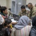Soldiers Process Afghan Evacuees in Qatar