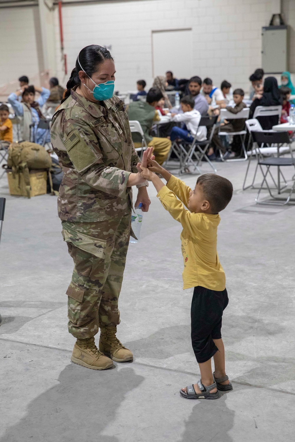 Soldiers Bring Comfort and Safety to Afghan Evacuee Children in Qatar