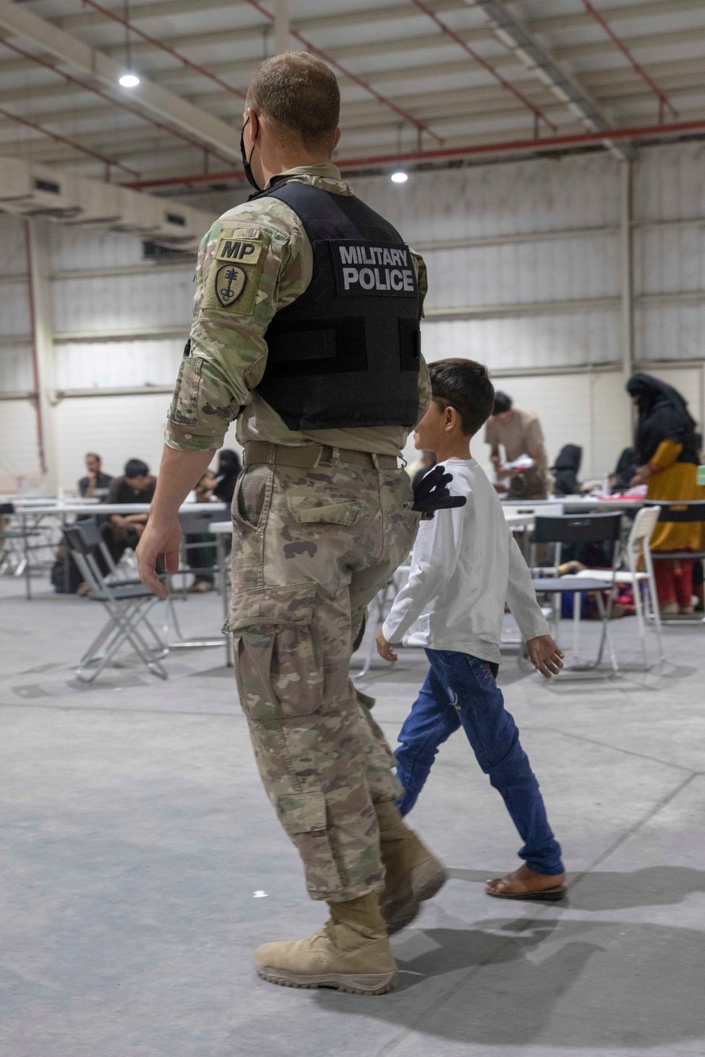 Soldiers Bring Comfort and Safety to Afghan Evacuee Children in Qatar