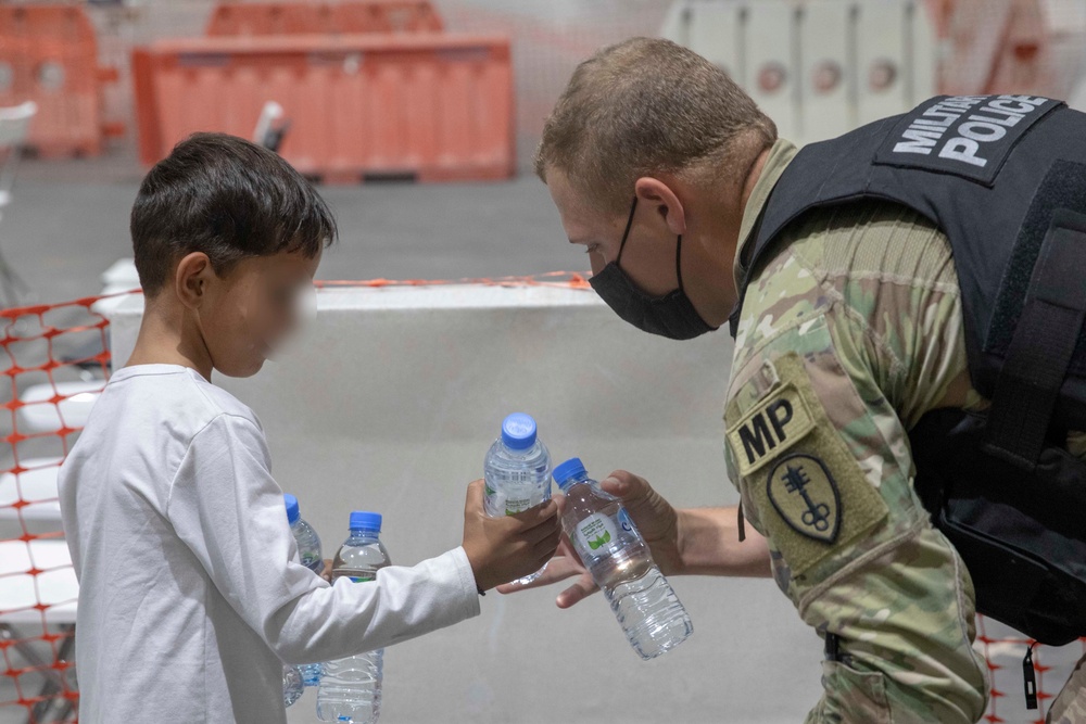 Soldiers Bring Comfort and Safety to Afghan Evacuee Children in Qatar