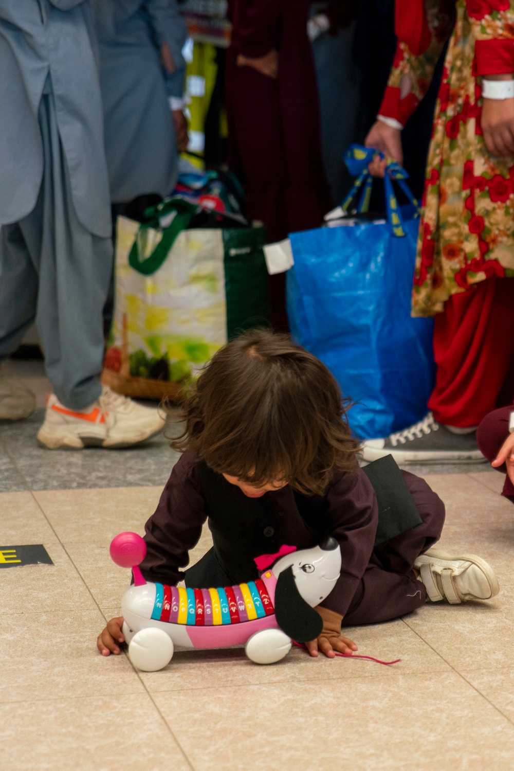 Evacuees depart NAVSTA Rota for the United States