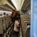 Evacuees depart NAVSTA Rota for the United States