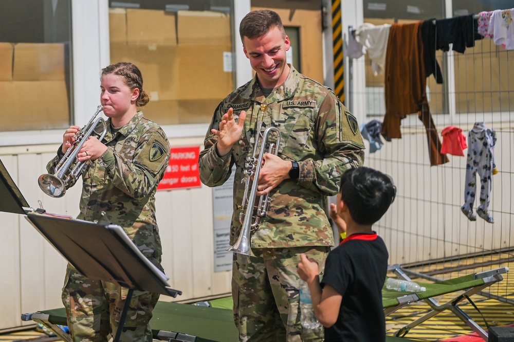 U.S. Army Europe- Africa Band and Chorus perform for evacuees at Ramstein Air Base