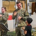 U.S. Army Europe- Africa Band and Chorus perform for evacuees at Ramstein Air Base