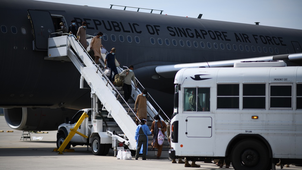 Evacuees arrive from the Republic of Singapore