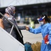 Evacuees arrive from the Republic of Singapore