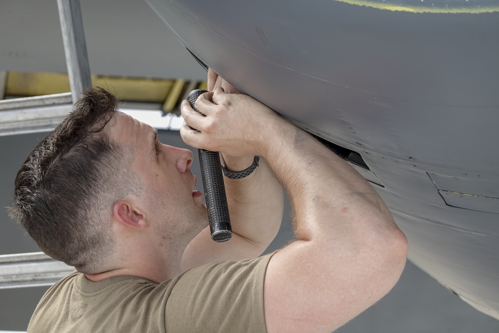 Airmen perform checks and fuels B-52