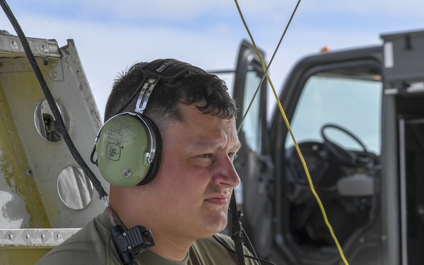 Airmen perform checks and fuels B-52