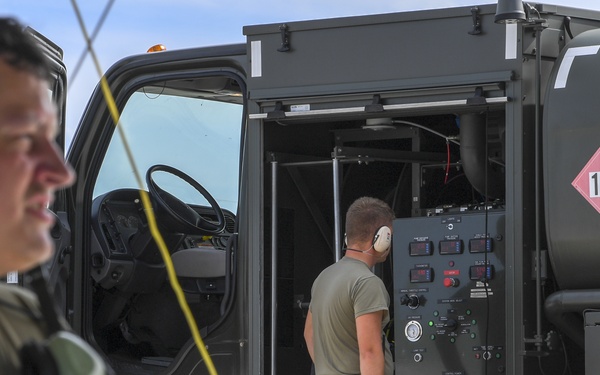 Airmen perform checks and fuels B-52