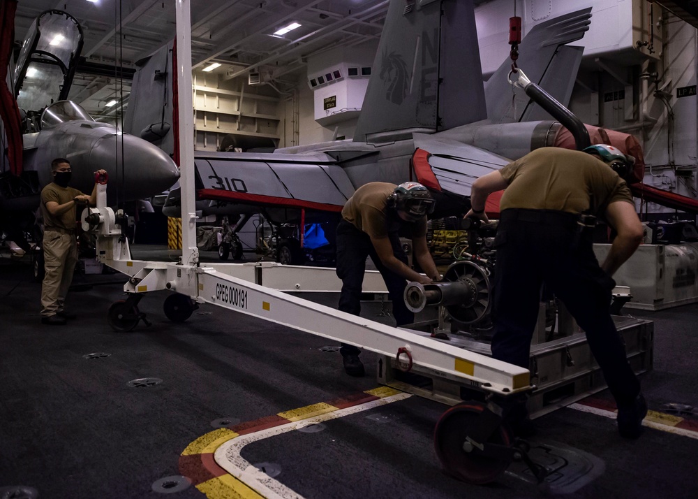 Helicopter Sea Combat Squadron (HSC) 4 Installs Helicopter Engine