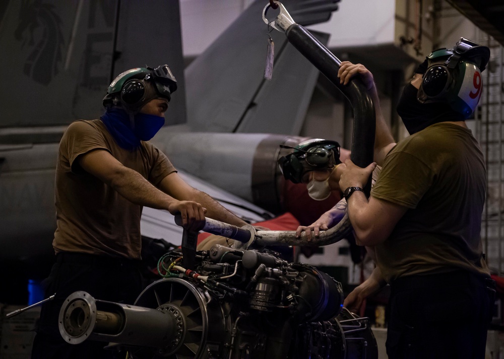 Helicopter Sea Combat Squadron (HSC) 4 Installs Helicopter Engine