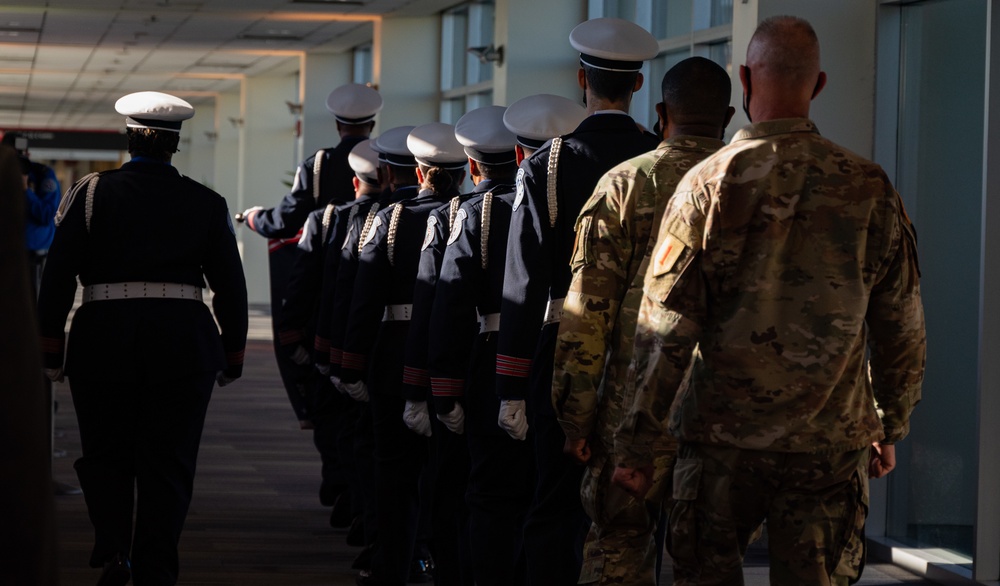 U.S. Service Members, TSA Officers, a symbol of unity in remembrance of those lost in the September 11, 2001, Terrorist Attacks