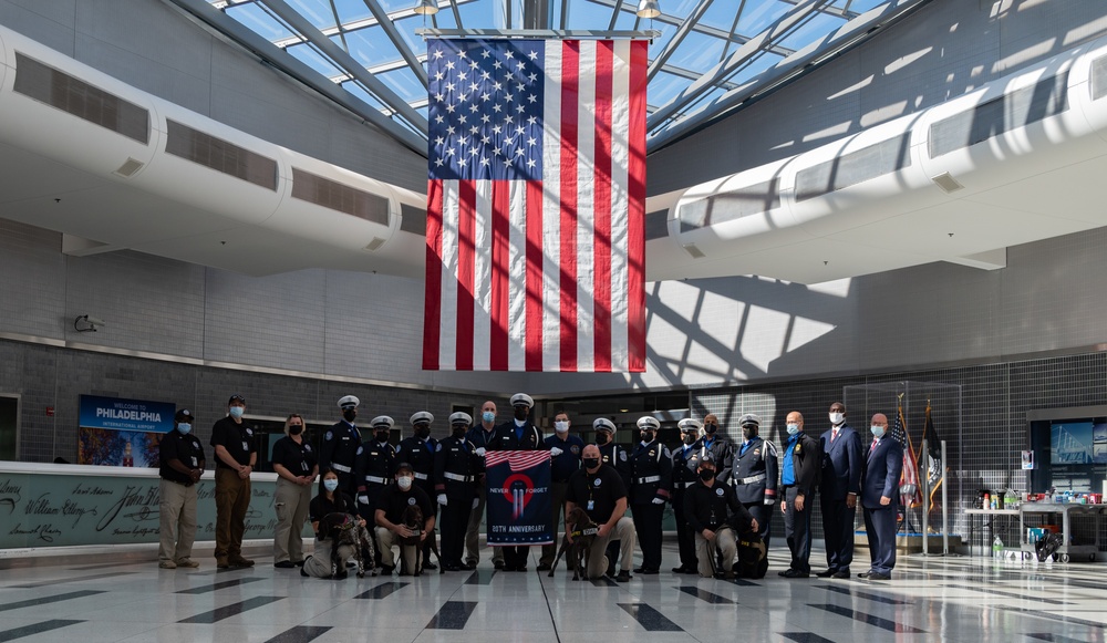 U.S. Service Members, TSA Officers, a symbol of unity in remembrance of those lost in the September 11, 2001, Terrorist Attacks