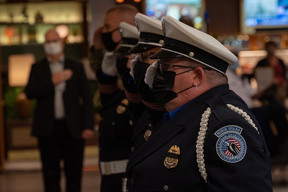 U.S. Service Members, TSA Officers, a symbol of unity in remembrance of those lost in the September 11, 2001, Terrorist Attacks