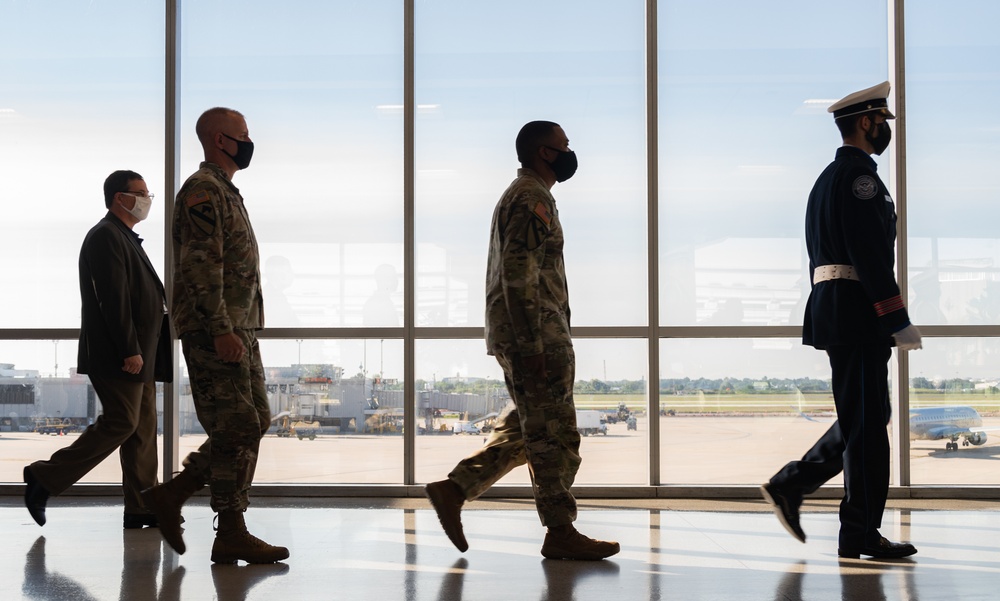 U.S. Service Members, TSA Officers, a symbol of unity in remembrance of those lost in the September 11, 2001, Terrorist Attacks
