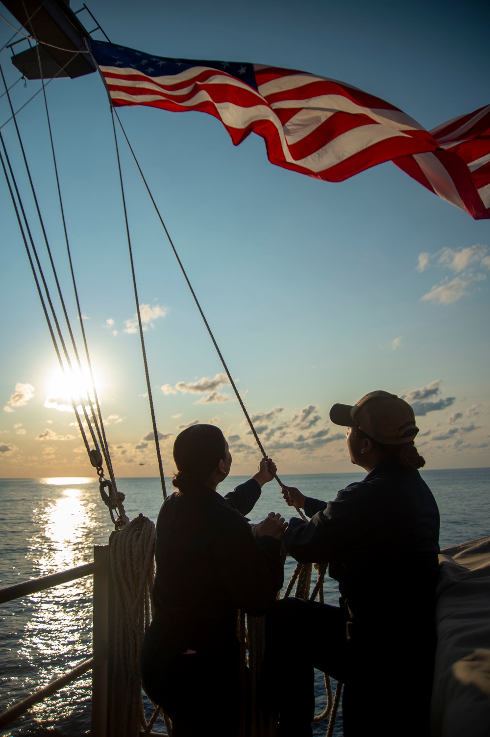 Sailors Raise Battle Ensign