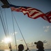 Sailors Raise Battle Ensign