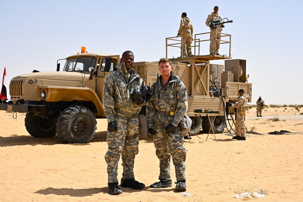 U.S. Army Soldiers partner with Jordanian and Egyptian CBRN specialists to execute the stages of decontamination