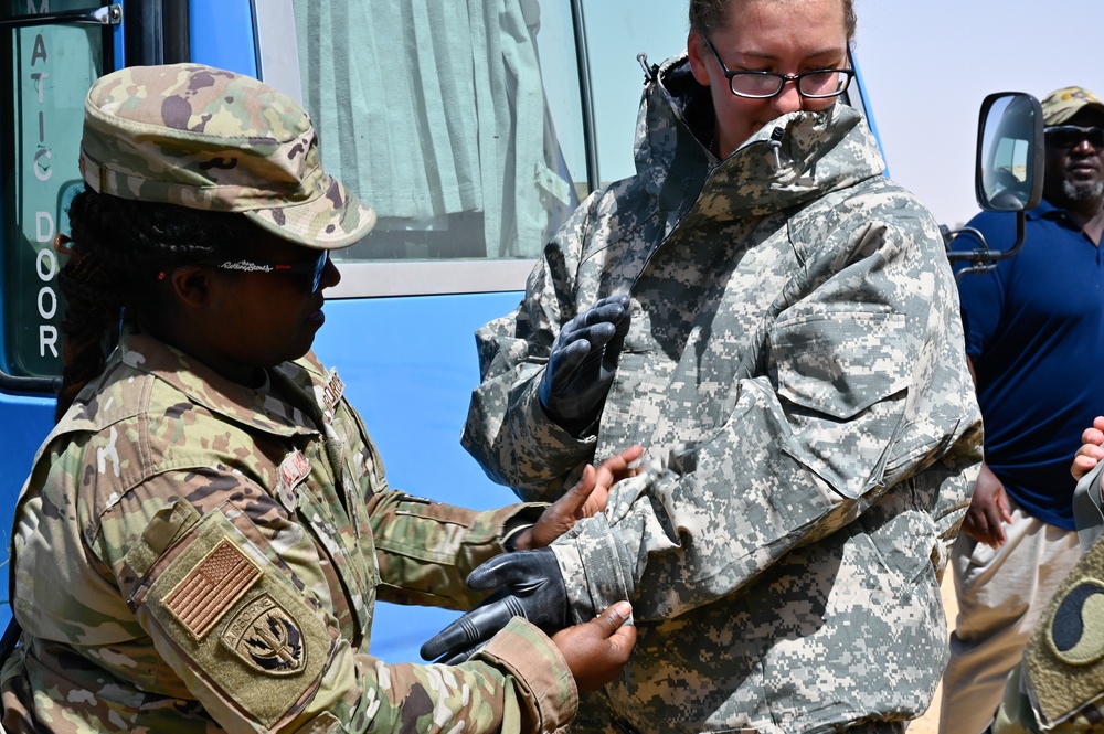 U.S. Army Soldiers partner with Jordanian and Egyptian CBRN specialists to execute the stages of decontamination