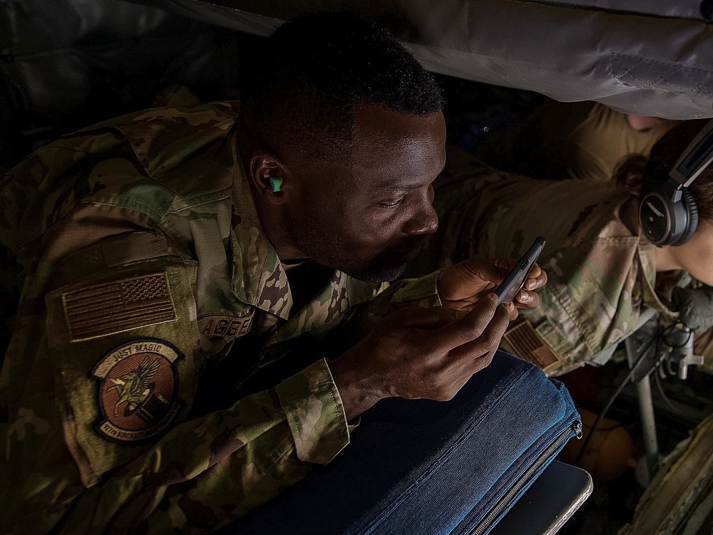 927th Airmen watch the refueling of F-16s