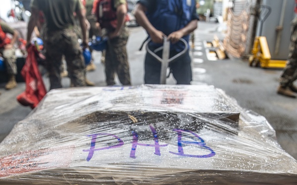U.S. Marines, Sailors with 11th MEU, USS Pearl Harbor receive cargo