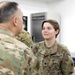Lt. Gen. Paul Calvert coins Soldiers of Task Force Phoenix at Camp Buehring