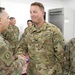 Lt. Gen. Paul Calvert coins Soldiers of Task Force Phoenix at Camp Buehring