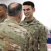 Lt. Gen. Paul Calvert coins Soldiers of Task Force Phoenix at Camp Buehring