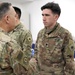 Lt. Gen. Paul Calvert coins Soldiers of Task Force Phoenix at Camp Buehring