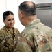 Lt. Gen. Paul Calvert coins Soldiers of Task Force Phoenix at Camp Buehring