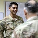 Lt. Gen. Paul Calvert coins Soldiers of Task Force Raptor at Camp Buehring