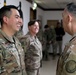 Lt. Gen. Paul Calvert coins Soldiers of Task Force Phoenix, 40th Combat Aviation Brigade at Camp Buehring