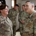 Lt. Gen. Paul Calvert coins Soldiers of Task Force Phoenix, 40th Combat Aviation Brigade at Camp Buehring