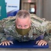 Command Chief does push-ups  a Suicide Prevention Awareness event.