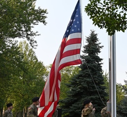 Troops salute flag during 9/11 ceremony
