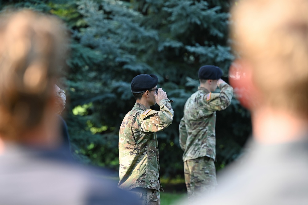 Troops salute flag during 9/11 ceremony