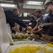 Mustin Sailors are Served Tacos at the Messdecks