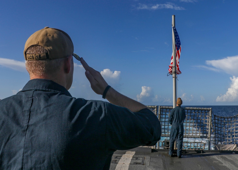 USS Billings Commanding Officer Salutes the Ensign During a 9/11 Remembrance Ceremony