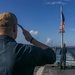 USS Billings Commanding Officer Salutes the Ensign During a 9/11 Remembrance Ceremony