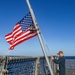 USS Billings Sailor Lowers the Ensign to Half-Mast During a 9/11 Remembrance Ceremony