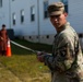 U.S. Army Soldier Tallies Afghan Personnel as they Recieve Donations During Operation Allies Welcome at Fort Pickett, Virginia.