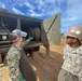 U.S. Navy Seabees assigned to NMCB-5 Detail Tinian train for future projects